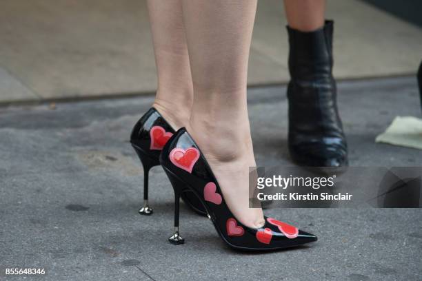 Model Sam Rollinson wears Prada shoes on day 2 of London Womens Fashion Week Spring/Summer 2018, on September 16, 2017 in London, England.