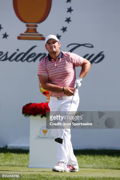 Golfer Patrick Reed tees off on the first hole during the second round of the Presidents Cup at Liberty National Golf Club on September 29, 2017 in...