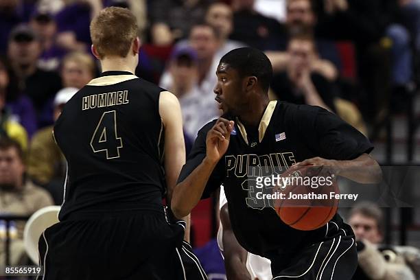 Twaun Moore of the Purdue Boilermakers moves the ball against the Washington Huskies during the second round of the NCAA Division I Men's Basketball...