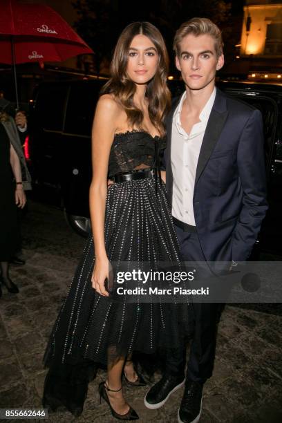 Kaia Gerber and her brother Presley Gerber attend "Her Time" Omega Outside Arrivals as part of the Paris Fashion Week Womenswear Spring/Summer 2018...