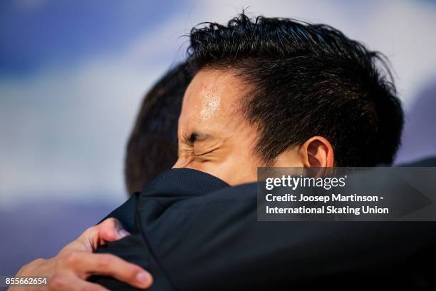 Julian Zhi Jie Yee of Malaysia reacts at the kiss and cry in the Men's Free Skating during the Nebelhorn Trophy 2017 at Eissportzentrum on September...