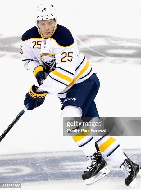 Mikhail Grigorenko of the Buffalo Sabres plays in a game against the New York Rangers at Madison Square Garden on January 3, 2015 in New York, New...
