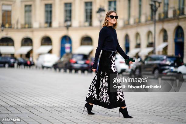 Olivia Palermo is seen during Paris Fashion Week on September 29, 2017 in Paris, France.