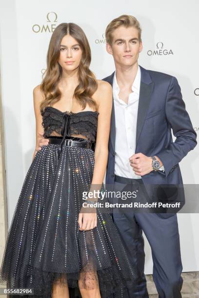 Kaia Gerber and Presley Gerber attend "Her Time" Omega Photocall as part of the Paris Fashion Week Womenswear Spring/Summer 2018 on September 29,...