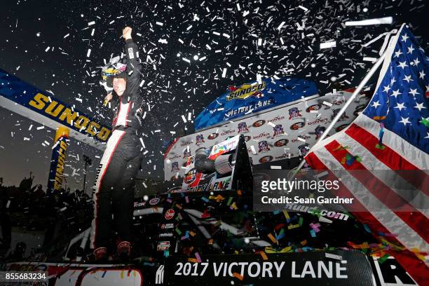 Harrison Burton, driver of the DEX Imaging Toyota, celebrates in Victory Lane after winning the NASCAR K&N Pro Series East Championship and the...