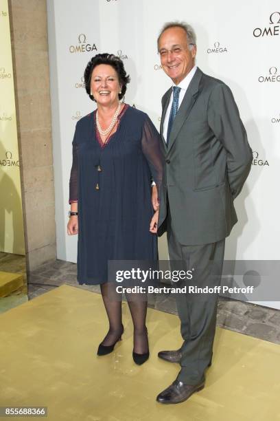 Of Swatch France, Florence Ollivier-Lamarque and her husband Thierry Ollivier-Lamarque attend "Her Time" Omega Photocall as part of the Paris Fashion...