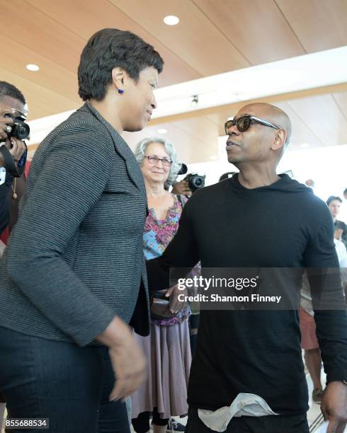 Washington, DC Mayor Muriel Bowser and Dave Chappelle at the Duke Ellington School of the Arts on September 29, 2017 in Washington, DC.