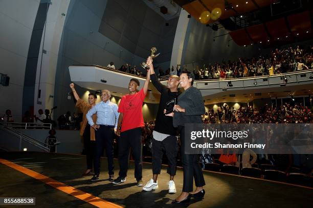 Tia Powell-Harris, CEO of the Duke Ellington School of the Arts; Peggy Cooper Cafritz, co-founder of the Duke Ellington School of the Arts; student...