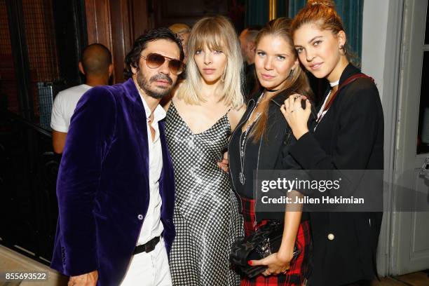 Olivier Zahm, Amanda Wall, both wearing Ralph Lauren, Victoria Swarovski and Paulina Swarovski attend the Ralph Lauren & Purple Magazine Cocktail as...