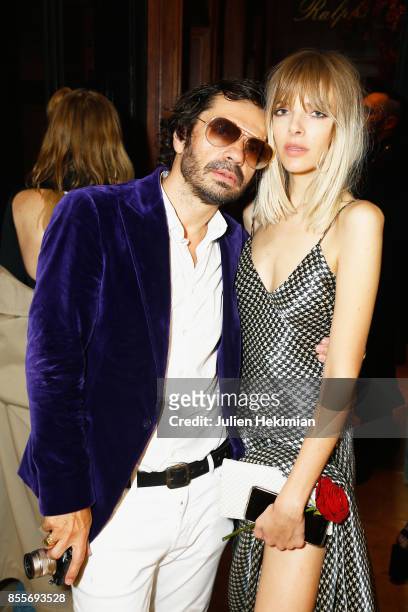 Olivier Zahm and Amanda Wall, both wearing Ralph Lauren, attend the Ralph Lauren & Purple Magazine Cocktail as part of the Paris Fashion Week...