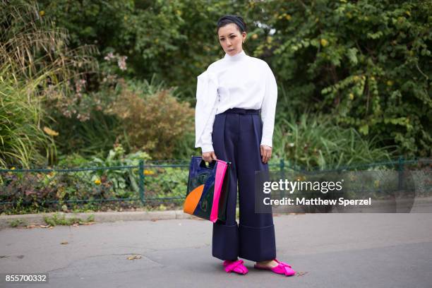 Jeannie Lee is seen attending Issey Miyake during Paris Fashion Week wearing Delpozo on September 29, 2017 in Paris, France.