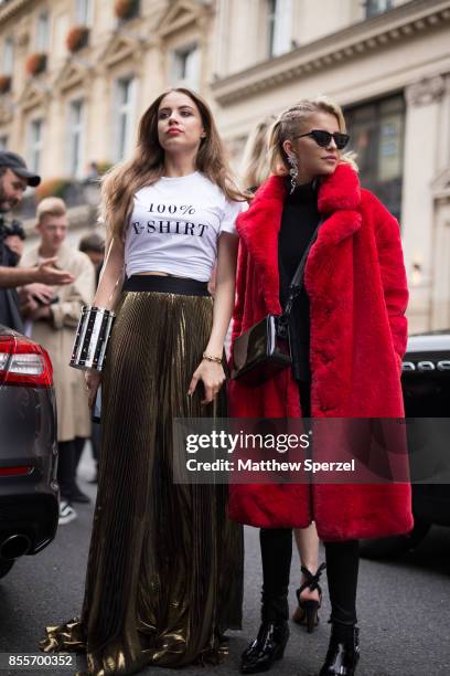 Caroline Daur & XENIA TCHOUMI are seen attending Undercover during Paris Fashion Week on September 29, 2017 in Paris, France.