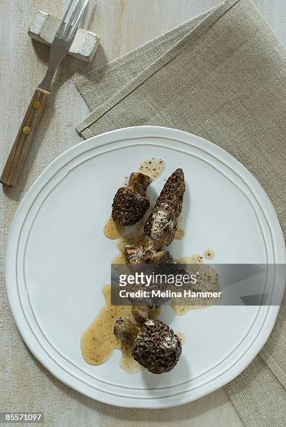mushrooms and butter - morel mushroom stock pictures, royalty-free photos & images