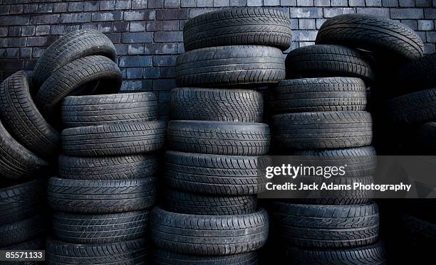 pile of tyres - car wheels stock pictures, royalty-free photos & images