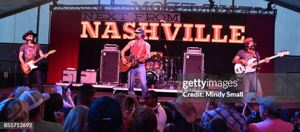 Jess Carson, Mark Wystrach and Cameron Duddy of Midland perform during the Route 91 Harvest country music festival at the Las Vegas Village on...