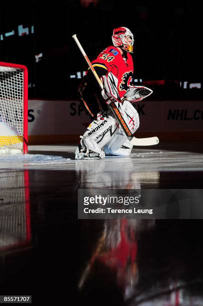 Miikka Kiprusoff of the Calgary Flames skates in the warmup before the game against the Detroit Red Wings on March 23, 2009 at Pengrowth Saddledome...