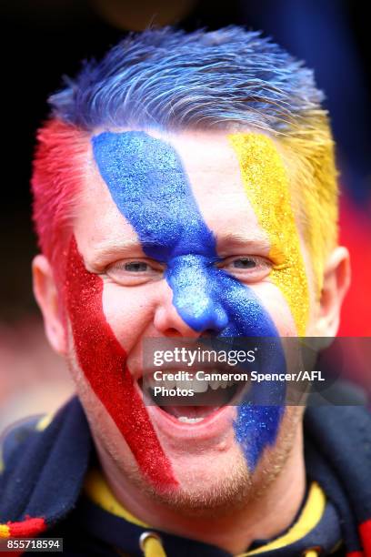 Crows fan shows his colours during the 2017 AFL Grand Final match between the Adelaide Crows and the Richmond Tigers at Melbourne Cricket Ground on...