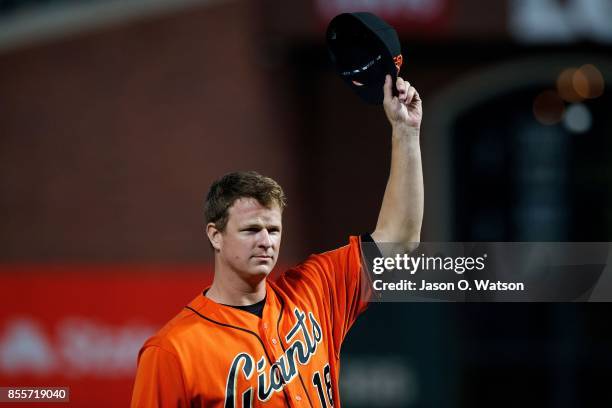 Matt Cain of the San Francisco Giants tips his cap during a pre-game ceremony before the game against the San Diego Padres at AT&T Park on September...