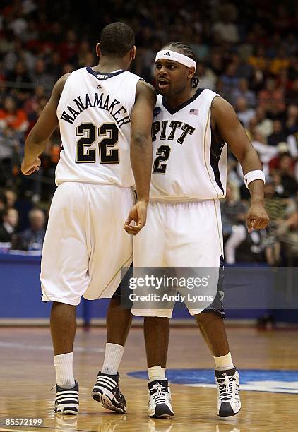 Levance Fields#2 of the Pittsburgh Panthers celebrates with teammate Brad Wanamaker late in the game against the Oklahoma State Cowboys during the...