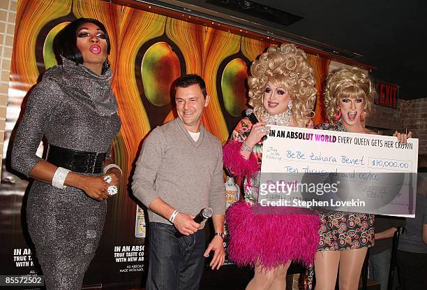 Winner Bebe Zahara Benet receives a check from Absolut VP of Multicultural Marketing Jeffrey Moran at RuPaul's Drag Race Winner Event at Therapy Bar...