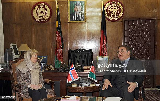 Afghan Minister of Defence Abdul Rahim Wardak talks with Norwegian Minister of Defence Anne-Grete Strom-Erichsen at the Defence Ministry in Kabul on...