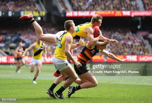 Jack Riewoldt of the Tigers takes a mark over Jake Lever of the Crows during the 2017 AFL Grand Final match between the Adelaide Crows and the...