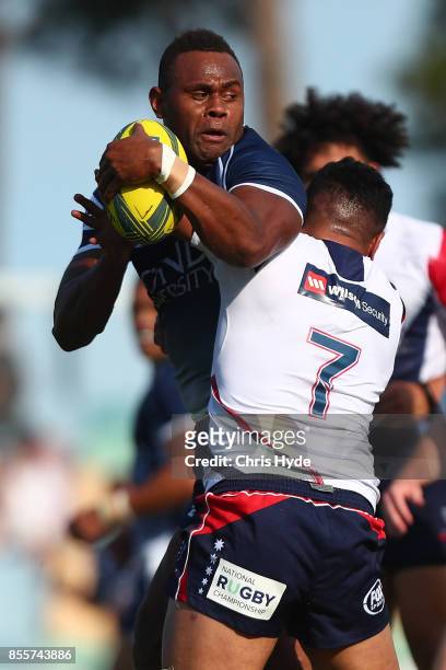 Eto Nabuli of Queensland Country is takled during the round five NRC match between Queensland Country and Melbourne at Bond University on September...