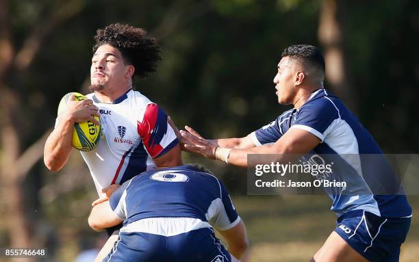 Hunter Paisami of the Rising runs with the ball during the round five NRC match between Queensland Country and Melbourne at Bond University on...