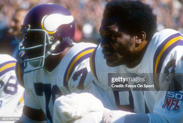 Carl Eller and Jim Marshall of the Minnesota Vikings looks on from the bench during an NFL football game circa 1969. Eller played for the Vikings...