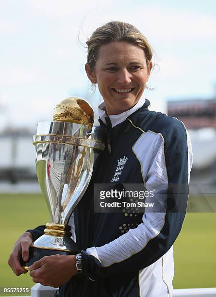 Charlotte Edwards, the England captain, holds the World Cup trophy after the England Womens Cricket Team won the ICC Womens World Cup at Lords...