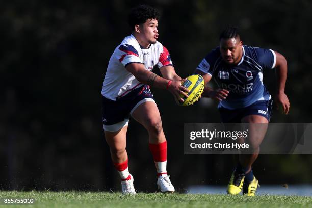 Hunter Paisami of Melbourne Rising runs the ball during the round five NRC match between Queensland Country and Melbourne at Bond University on...