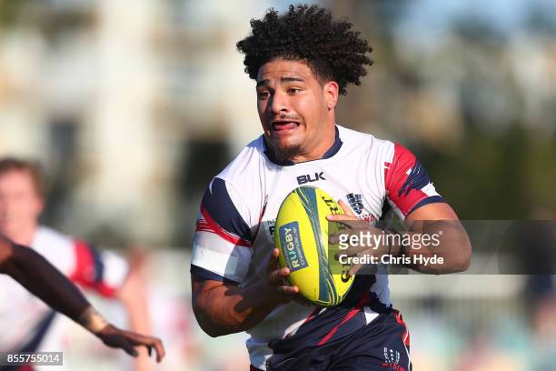 Sione Tuipulotu of Melbourne Rising runs the ball during the round five NRC match between Queensland Country and Melbourne at Bond University on...