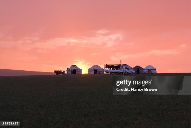 yurts at sunset in inner mongolia, china - yurt stock pictures, royalty-free photos & images