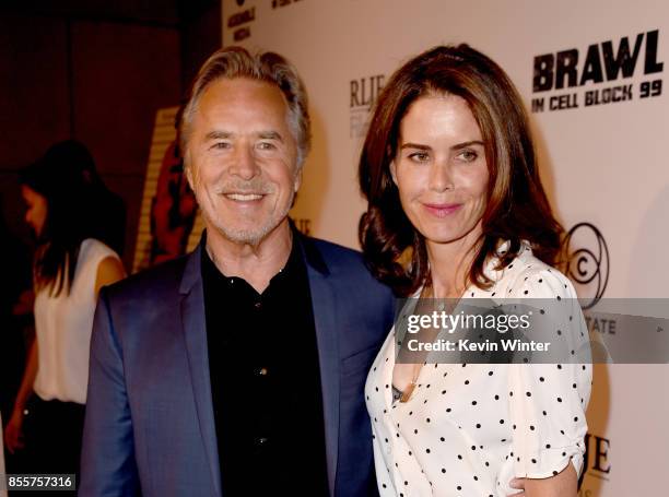 Actor Don Johnson and his wife Kelley Phleger arrive at the premiere of RLJE Films' "Brawl In Cell Block 99" at the Egyptain Theatre on September 29,...