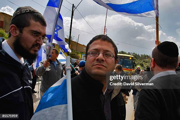 Right-wing Israeli extremist Itamar Ben-Gvir leads a provocative march with flags March 24, 2009 in Umm al-Fahm in northern Israel. Violent clashes...
