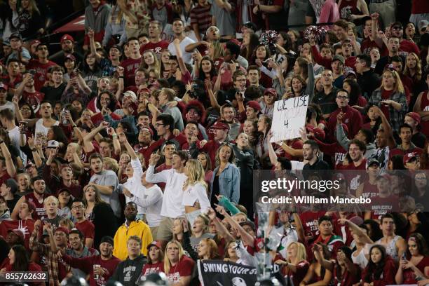 Fans for the Washington State Cougars cheer for their team in the game against the USC Trojans at Martin Stadium on September 29, 2017 in Pullman,...