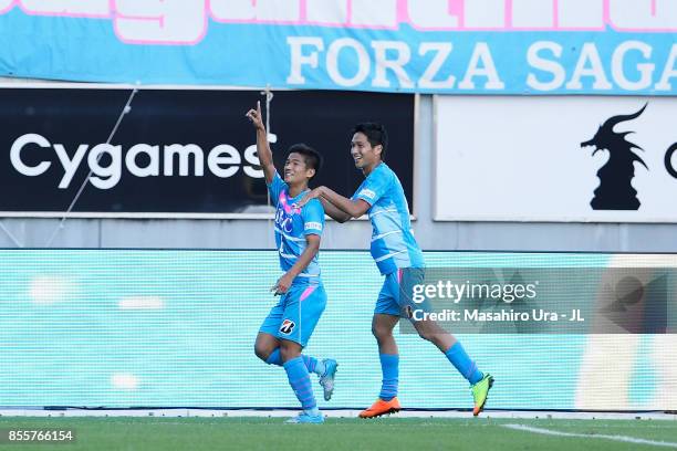 Akito Fukuta of Sagan Tosu celebrates scoring the opening goal with his team mate Riki Harakawa during the J.League J1 match between Sagan Tosu and...