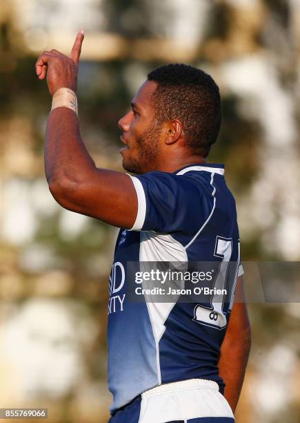 Qld Country's Filipo Daugunu scores a try during the round five NRC match between Queensland Country and Melbourne at Bond University on September...