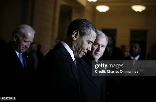 Behind the scenes as President Barack H. Obama says farewell to former President George W. Bush at the Capital after being sworn in by Chief Justice...