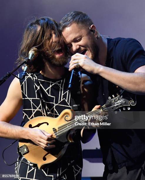 Guitarist Wayne Sermon and frontman Dan Reynolds of Imagine Dragons perform during a stop of the band's Evolve World Tour at T-Mobile Arena on...