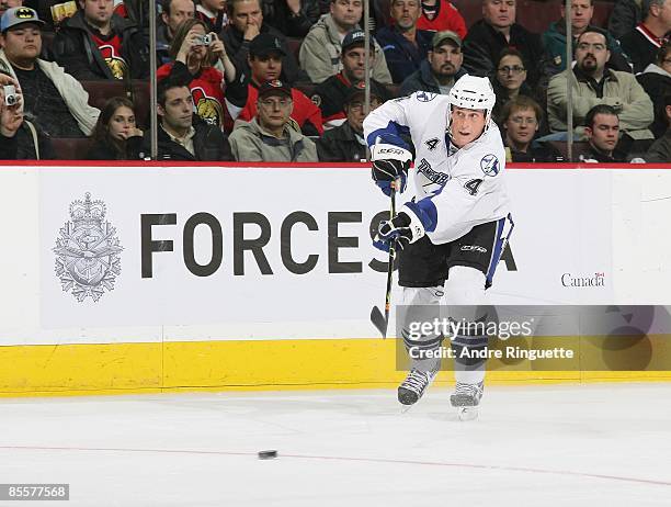 Vincent Lecavalier of the Tampa Bay Lightning passes the puck against the Ottawa Senators at Scotiabank Place on March 11, 2009 in Ottawa, Ontario,...