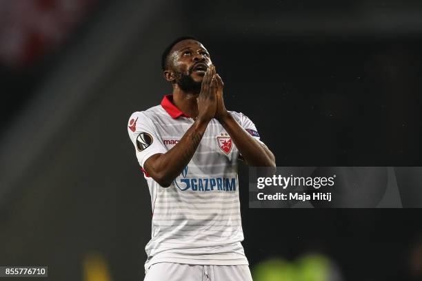 Guelor Kanga of Crvena Zvezda reacts during the UEFA Europa League group H match between 1. FC Koeln and Crvena Zvezda at RheinEnergieStadion on...