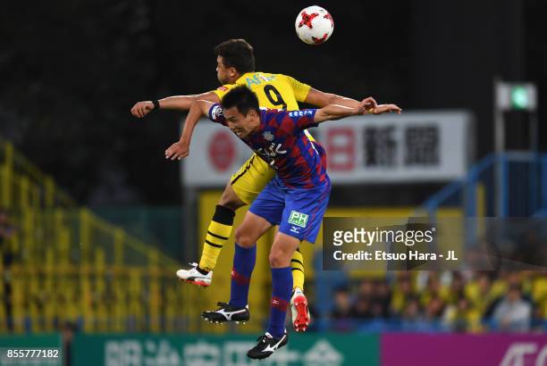 Cristiano of Kashiwa Reysol and Toshio Shimakawa of Ventforet Kofu compete for the ball during the J.League J1 match between Kashiwa Reysol and...