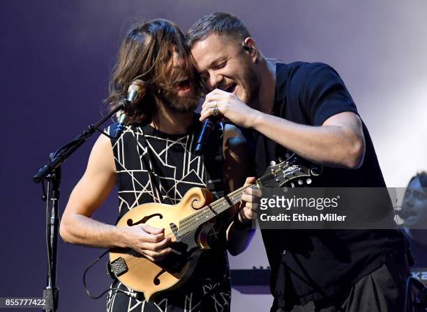 Guitarist Wayne Sermon and frontman Dan Reynolds of Imagine Dragons perform during a stop of the band's Evolve World Tour at T-Mobile Arena on...