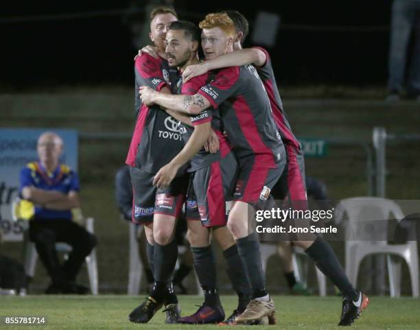 Adrian Zahra of Heidelberg United FC celebrates his goal with team mates during the National Premier Leagues Grand Final match between the Brisbane...