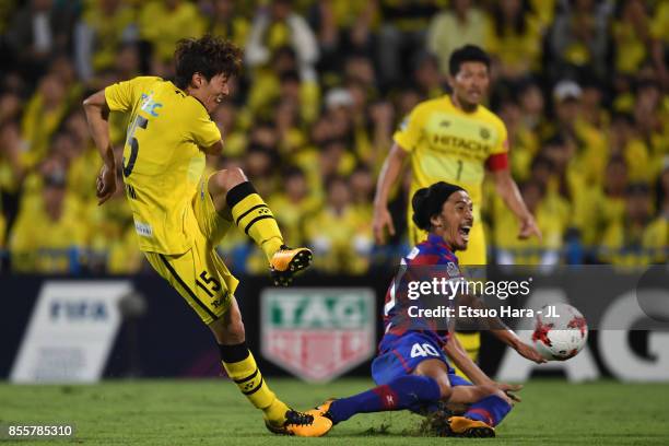 Kim Bo Kyung of Kashiwa Reysol shoots at goal while Shohei Ogura of Ventforet Kofu tries to block during the J.League J1 match between Kashiwa Reysol...