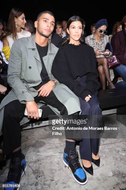 Younes Bendjima and Kourtney Kardashian attend the Haider Ackermann show as part of the Paris Fashion Week Womenswear Spring/Summer 2018 on September...