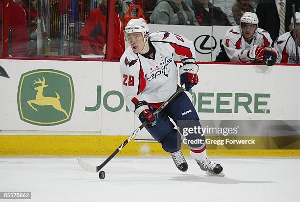 Alexander Semin of the Washington Capitals controls a rolling puck and skates with it during a NHL game against the Carolina Hurricanes on March 21,...