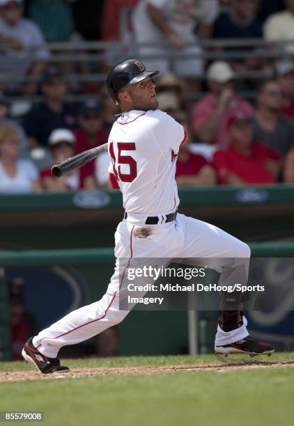 Dustin Pedroia of the Boston Red Sox bats during a spring training game against the Philadelphia Phillies at City of Palms Park on March 22, 2009 in...