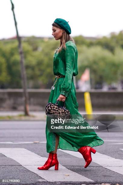 Angelica Ardasheva wears a green dress, red shoes, outside Kaviar Gauche, during Paris Fashion Week Womenswear Spring/Summer 2018, on September 29,...